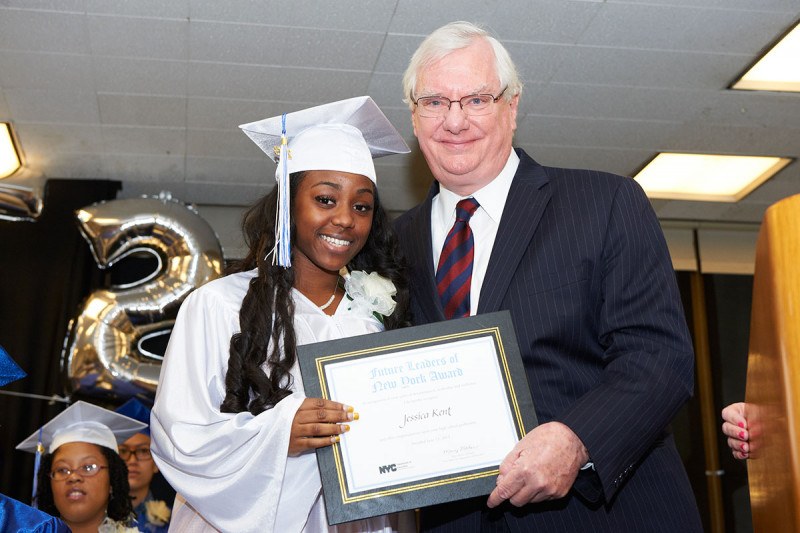 Jessica receives her certificate from Dr. O’Reilly.