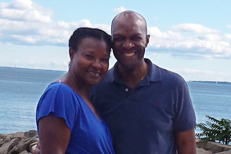 Veronica O’Neil and her husband Keith posing on a beach