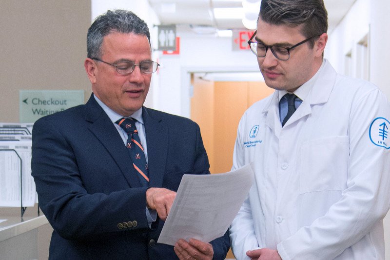 Urology surgeon Dr. Paul Russo with a colleague