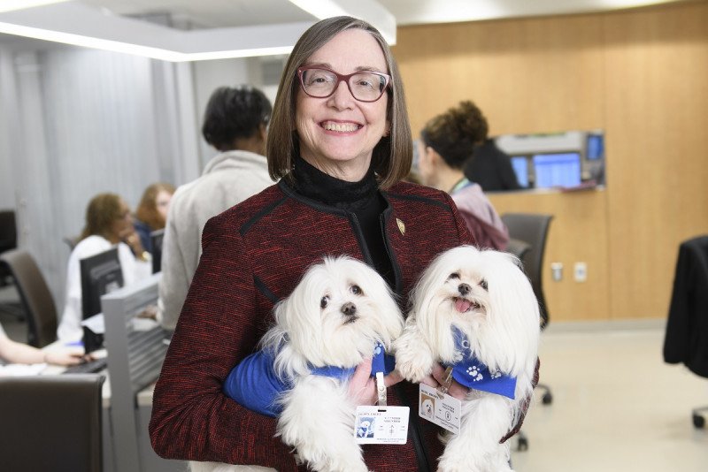 Elizabeth McCormick with MSK’s Caring Canines.