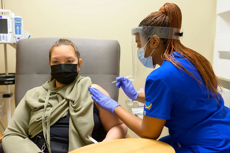 Patient receives a COVID-19 vaccine