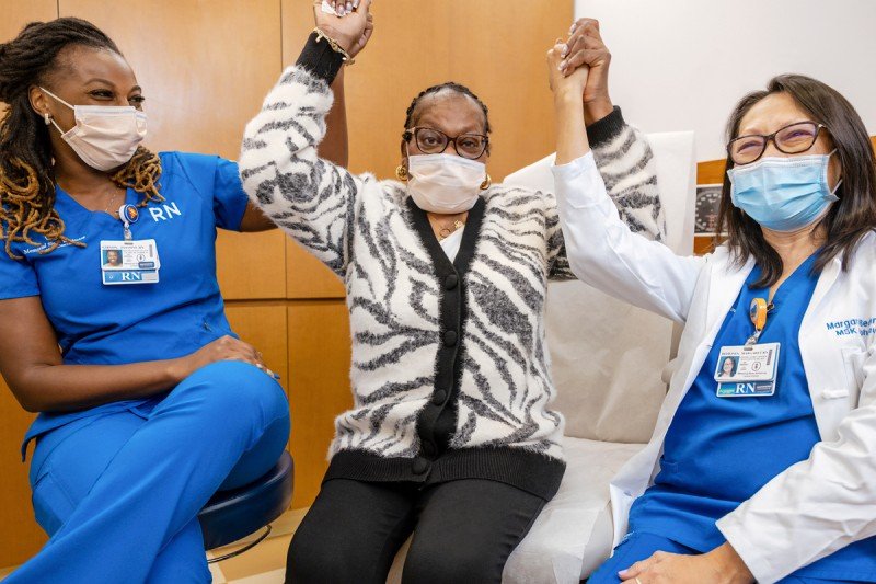 Memorial Sloan Kettering Ralph Lauren Center nurse Jasmine Gibson, breast cancer patient Maria Tucker, and nurse Margaret Bediones