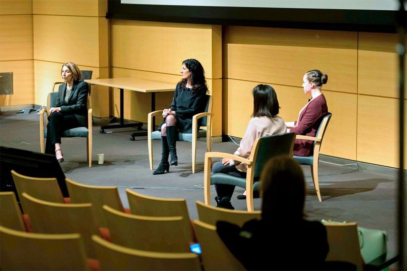 A panel discussion among four women