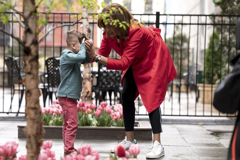 NBC's Hoda Kotb helps Rocco cover his eyes for a special surprise.