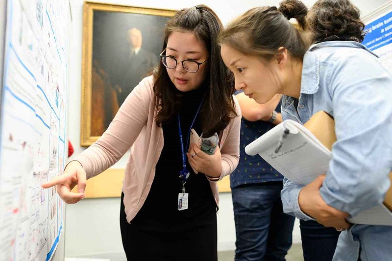 Research fellow Yahui Guo fron the Tobias Hohl Lab presents her work at a symposium.