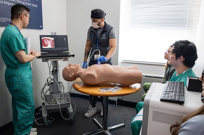 Senior fellow, Dr. Zaryab Umar, facilitates the cardiac station at the ultrasound workshop.