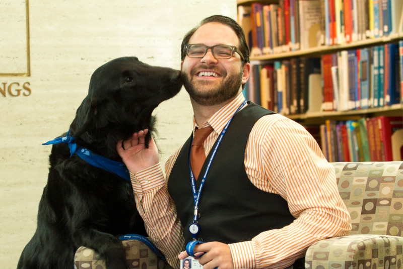 Pictured: Antonio De Rosa, with Tommy, a flat-coated retriever