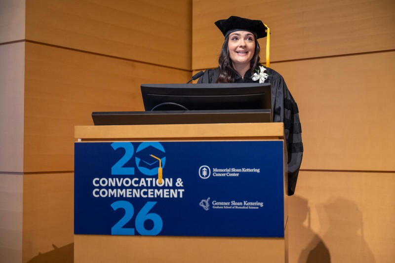 Dr. Delgado at the podium