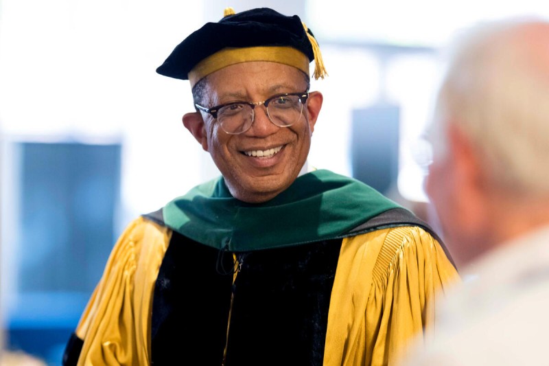 Selwyn Vickers speaks to an attendee