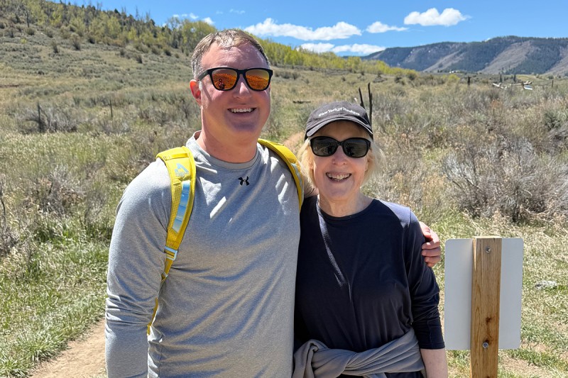 Andi Straus and her son, Nadav, pose on a hiking trail.