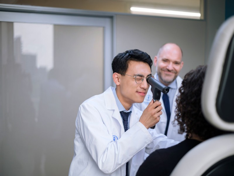 Associate Program Director, Dr. Brandon Imber, supervises PGY-3 resident, Dr. Joshua Qian, during a physical examination as part of a patient’s clinical evaluation.