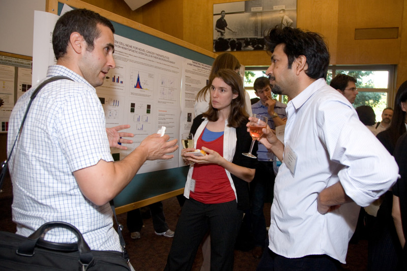 Young scientists talk at the poster session