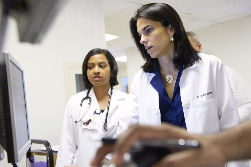 Medical oncologist Diane Reidy-Lagunes checks on a patient's lab result. 