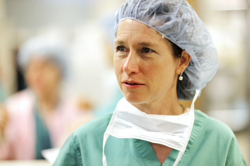 Surgeon Deborah Capko, expert in breast conservation surgery, sentinel node biopsy, and mastectomy dressed in scrubs.