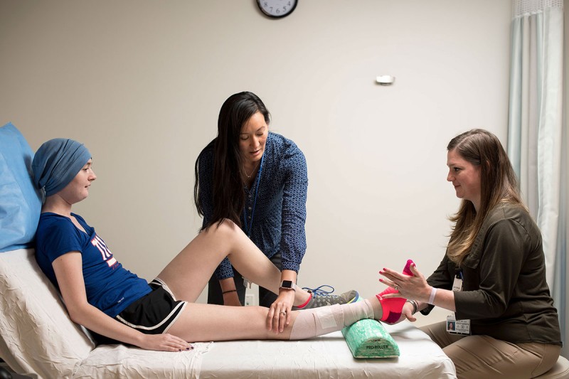 Patient with two MSK physical therapists
