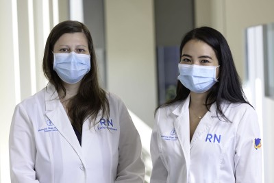 Clinical trial nurses Emily Toulouse and Julie Kinoshita