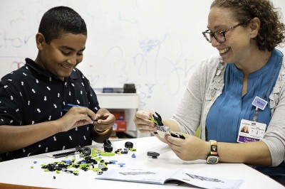 MSK Kids patient Jonathan with Jessica Anenber, Senior Child Life Specialist.