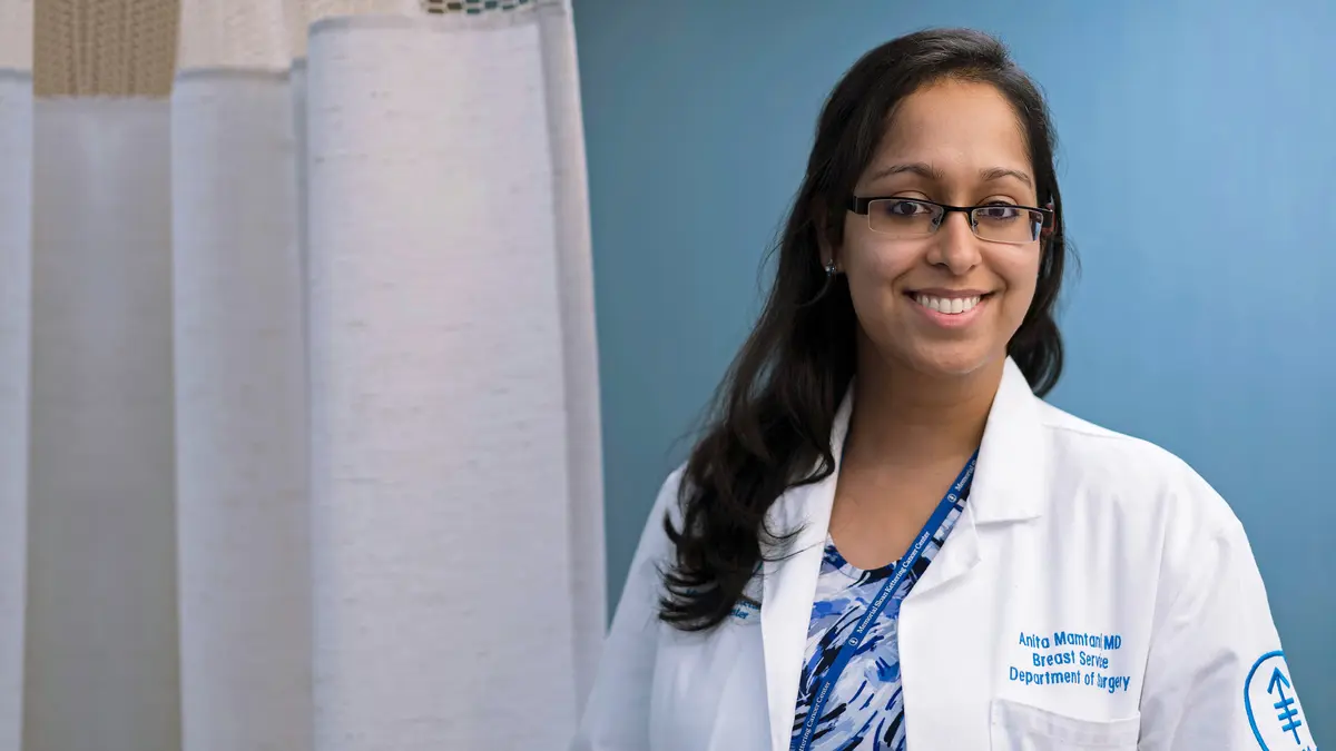 Dr. Diana E. Lake, an MSK breast oncologist, talks with a patient.