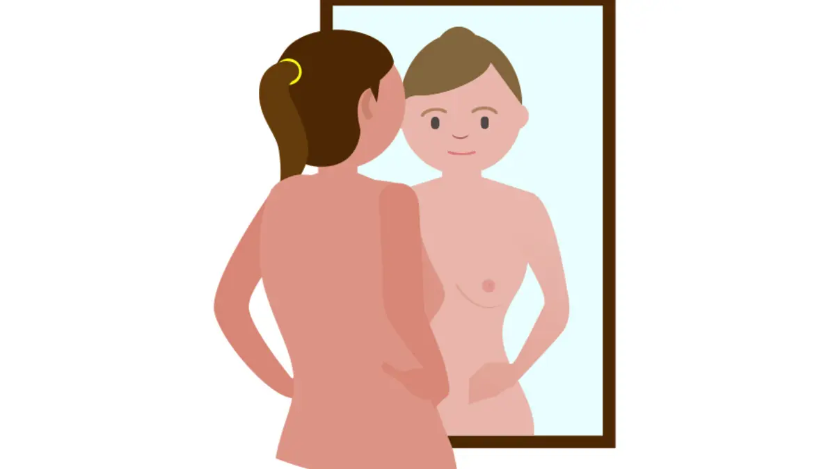 Breast self-exam in front of mirror