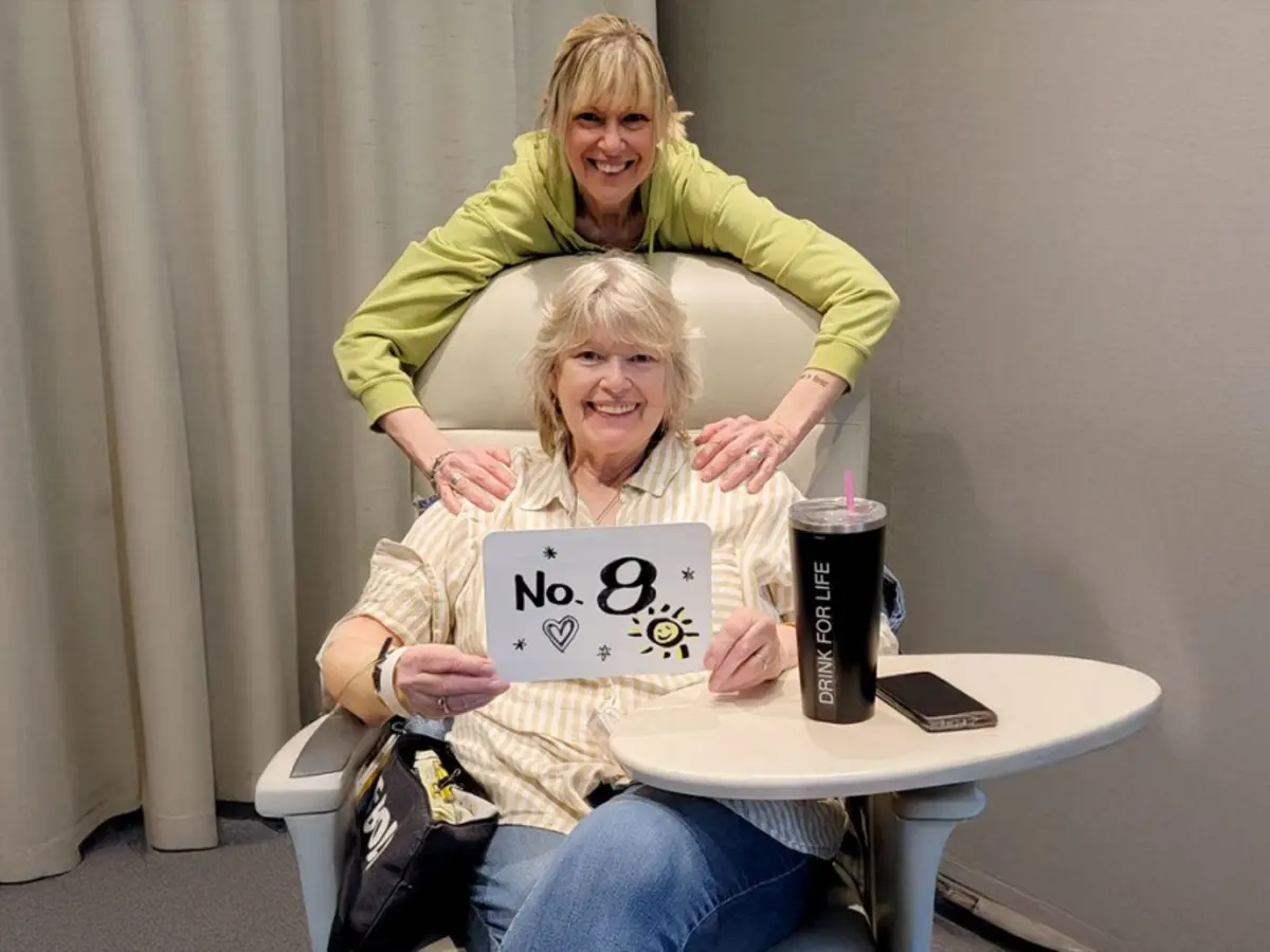 Maureen Sideris, seated, with her sister Marion