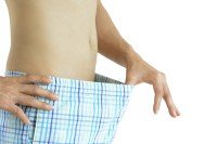 Man examining himself.