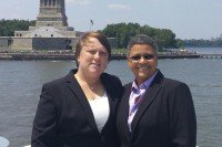 Memorial Sloan Kettering ovarian cancer patient Vilma Rosario and her partner, Michele Freeman, pose at the Statue of Liberty.