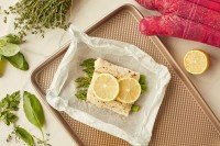 Fish, asparagus, and lemon on a plate