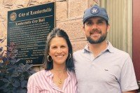 Woman and man standing side by side