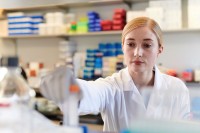 Paige Arnold working in a lab