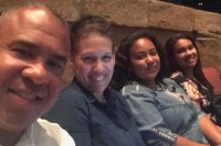 Jose Casa, MSK's Associate Director of Environmental Services, with wife and two daughters