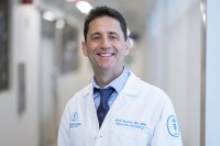 Boris Mueller, MD, Director, Radiation Oncology at MSK Bergen is seen standing in a hallway. 