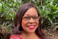 Lisa-Erika James, who participates in MSK's Visible Ink, is seen smiling. 