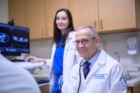 Colorectal Surgeon Dr. Julio Garcia-Aguilar seen in exam room with Nurse Kieran Kelleher