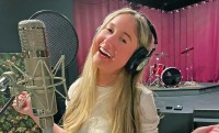 MSK patient and singer Annabel Gutherz singing in the studio after her recovery from thyroid surgery.