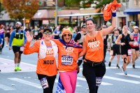 Fred's Team runners smile at supporters during the 2025 TCS New York City Marathon. 100% of the money raised through Fred's Team goes directly to cancer research at Memorial Sloan Kettering Cancer Center. (Photo credit Ben Solomon for Fred's Team)