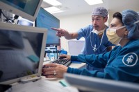 Urologic surgeon, Felix Cheung, MD, in the operating room.