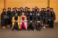 GSK Graduates and MSK Leadership pose on the stage