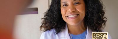 Nurse Practitioner Desiree Robinson pictured next to the US News & World Report badge for 2026-2027