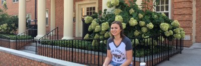 Memorial Sloan Kettering osteosarcoma patient Grace Franzese outside her dorm at Wake Forest University in North Carolina.