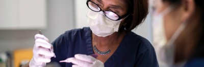 Dermatologist Dr. Kishwer S. Nehal performs a dermatologic procedure on patient