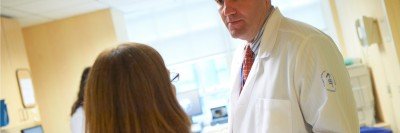 MSK medical oncologist Paul Sabbatini discusses treatment for ovarian cancer with a nurse