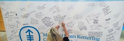 Survivors and family members at our Manhattan event signed their names on a wall and wrote messages to staff and other patients.