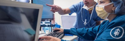 Urologic surgeon, Felix Cheung, MD, in the operating room.