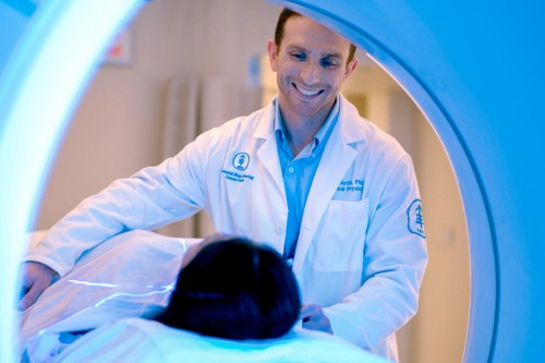 MSK physicist Eric Aliotta, PhD, with a patient.