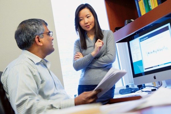 Pictured: Biostatisticians Venkatraman Seshan (left) and Ronglai Shen use computational methods to analyze cancer genome data. 